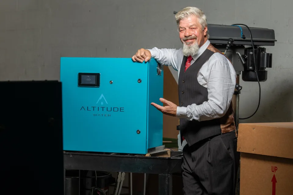 Altitude Water founder with an atmospheric water generator