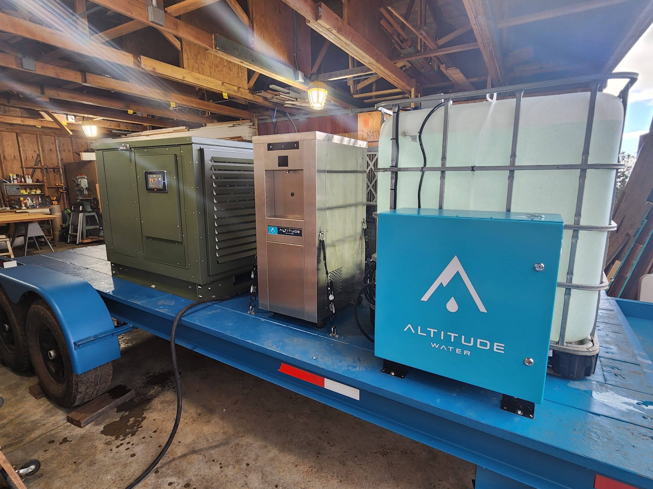 Altitude Water The Water Hub scaled system featuring atmospheric water generators and modular water production units installed on industrial platform for scalable clean water solutions